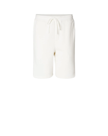 Model wearing a PRM50STPD Independent Trading Co. Pigment-Dyed Fleece Shorts